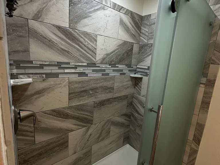 Master bath, walk in shower with rain shower head.