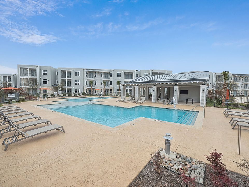 Resort-Style Pool With Sunbathing Deck