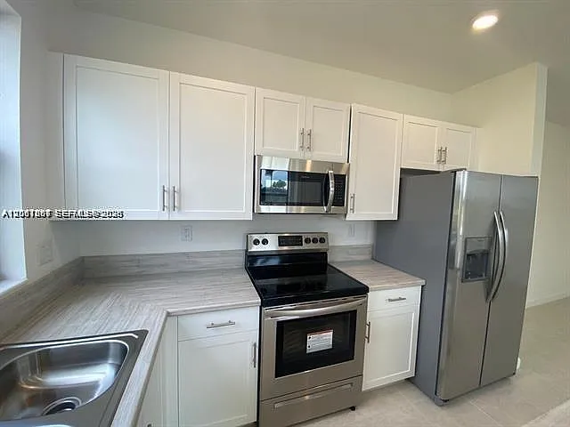 575 NE 208th Ter #575 — Photo 18