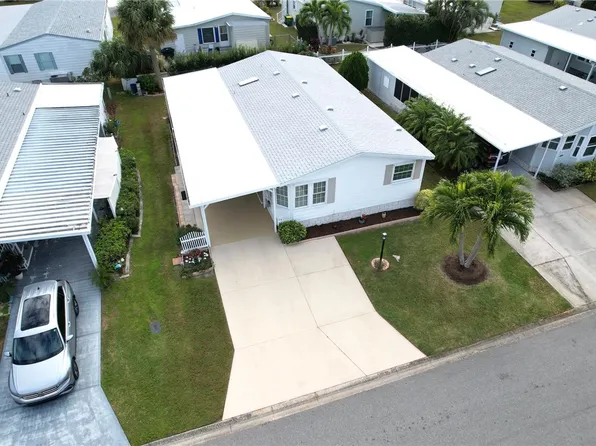 456 Dolphin Cir, Barefoot Bay, FL 32976