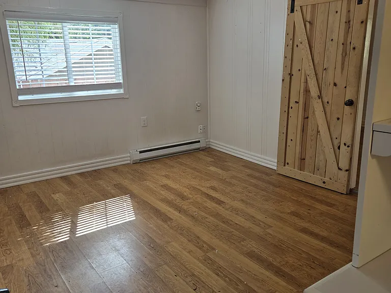 custom barn doors in the spacious bed room