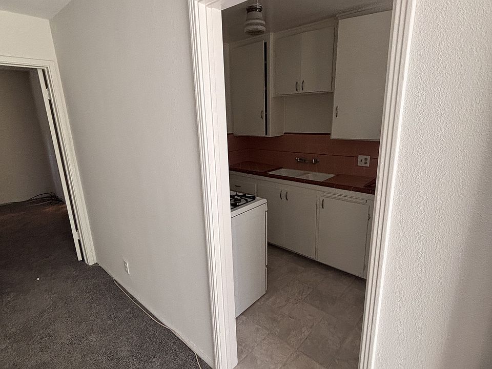 Entrance to kitchen, first door on the right