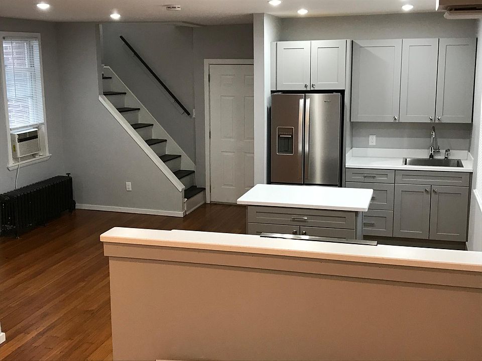 Kitchen, eat in area, steps to 2nd floor (bedrooms)