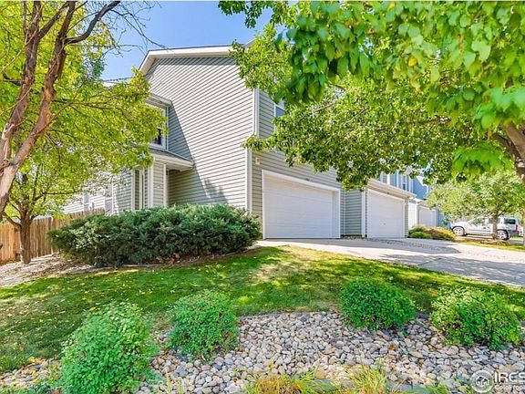 Front of house, yard.