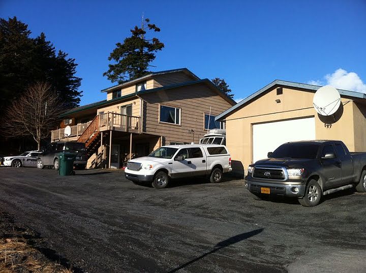 Back of the house, parking and shop