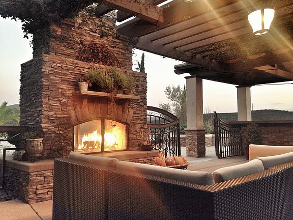 Ivy covered patio with 2-way fireplace