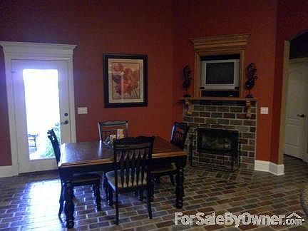 Fireplace in Kitchen
						:
						Beautiful gas fireplace in eating area