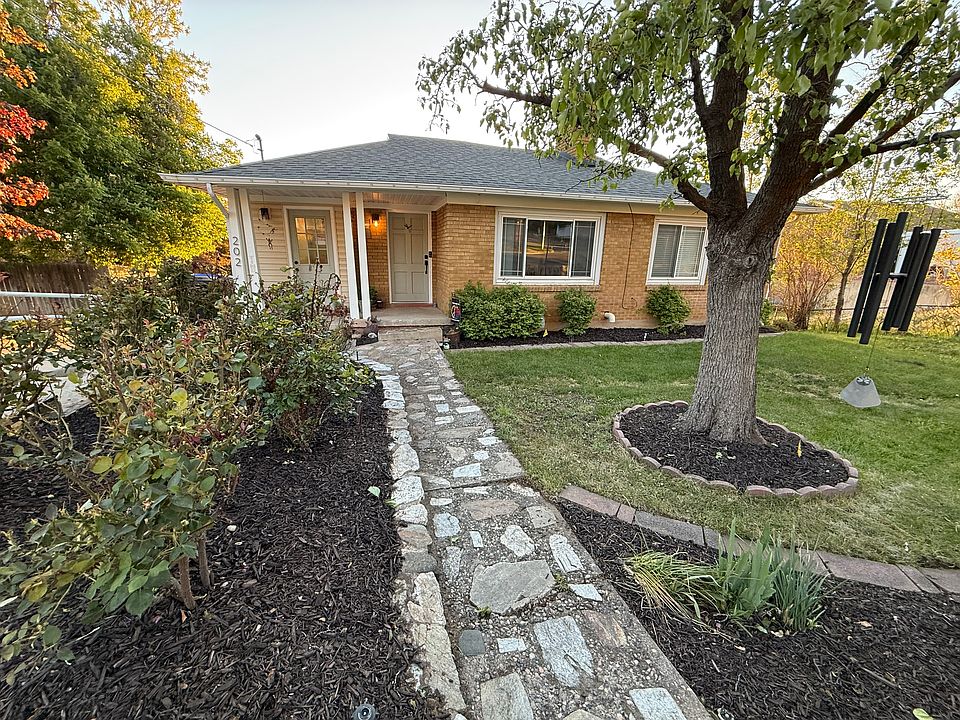 Front of home; with rose garden.