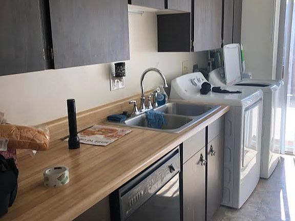 Kitchen area with W and D and Dishwasher