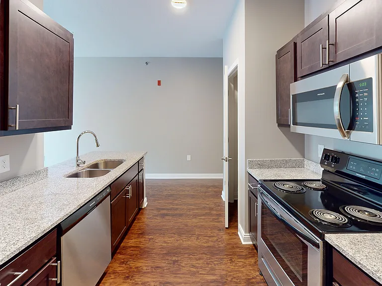 Everything in its place, including stainless appliances, a full pantry, double sink, and built-in dishwasher to make cleanup a breeze.
