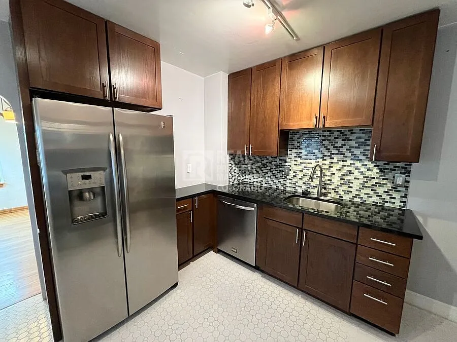 Charming 3-Bedroom Denver Home with Sunroom & Attached Garage — Photo 3