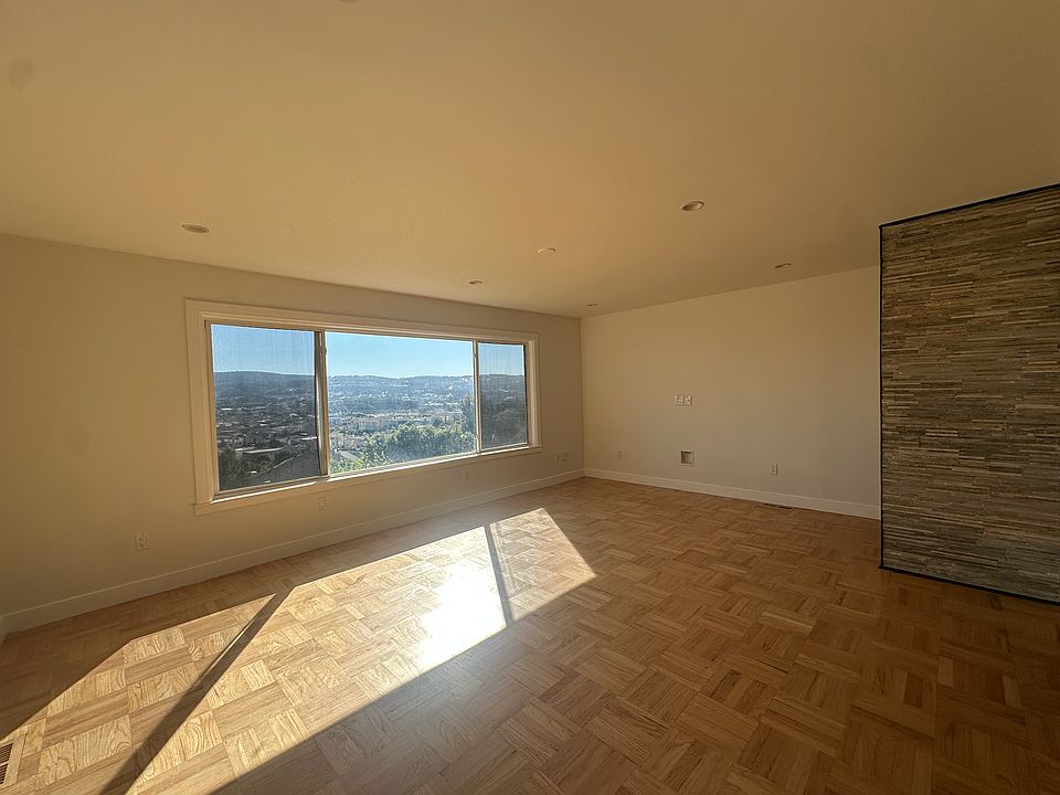 Living room with fireplace and TV Hookups
