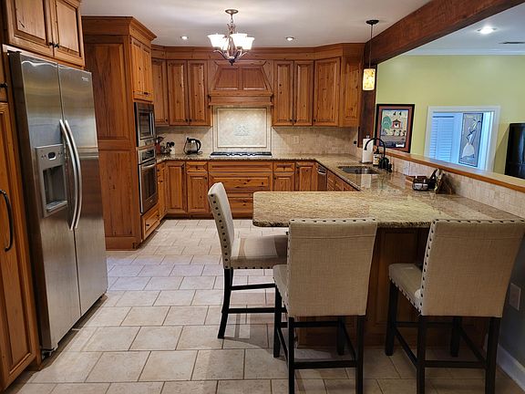 Custom cypress kitchen cabinets.