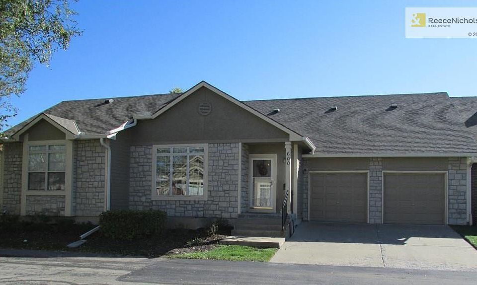 Front view showing two car garage.