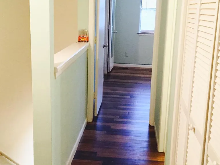 Upstairs hallway with laundry room
