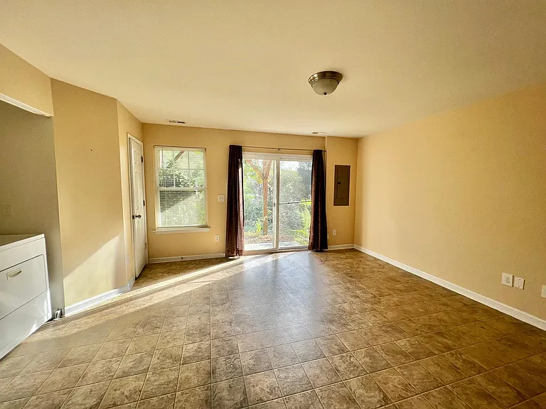 Large downstairs room with plenty of natural light