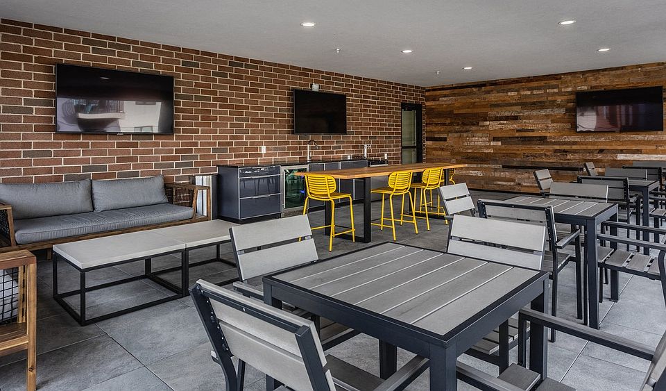 Private Sky Lounge Complete with Outdoor TVs and Kitchen Area