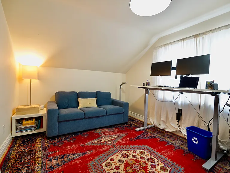 Upstairs office/guest room with adjustable height desk and monitors (included). Queen size sofa bed.