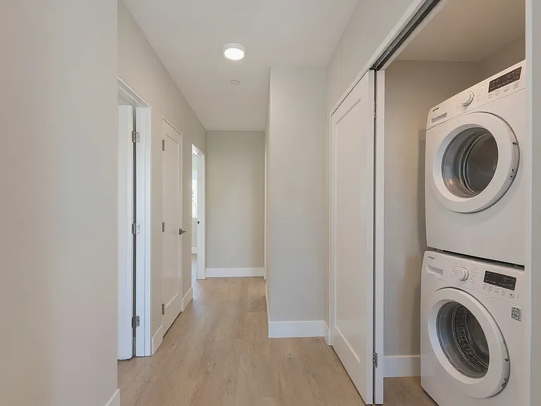 Washer and dryer in hallway closet on 3rd floor.