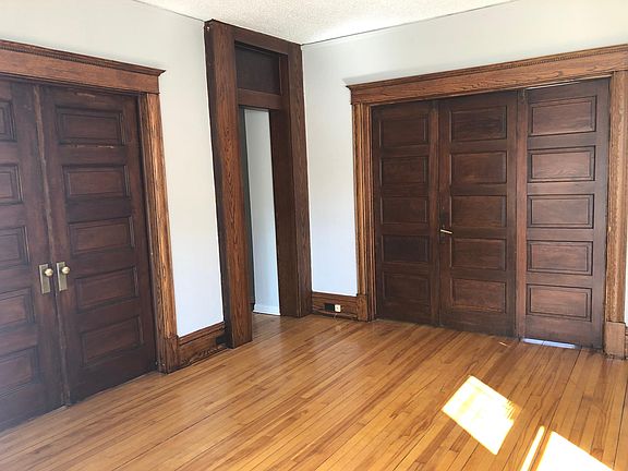 opposite view of living room w/ pocket doors closed.