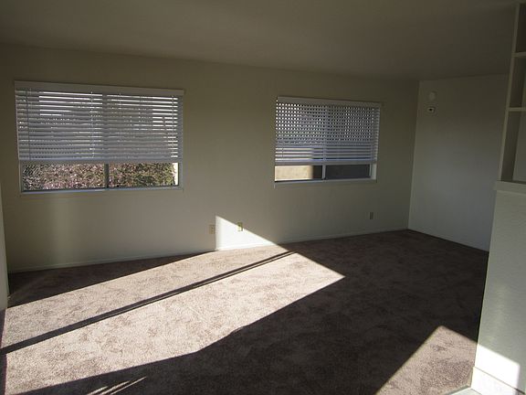 Similar to very spacious dining room and living room with balcony