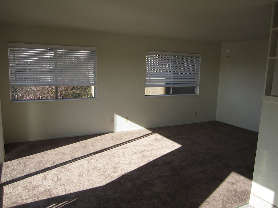 Similar to very spacious dining room and living room with balcony