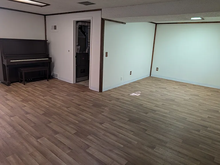 spacious area in basement by laundry room