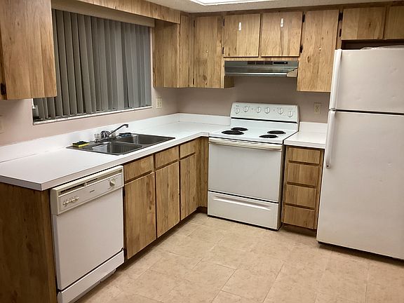 New tile in kitchen and laundry room.