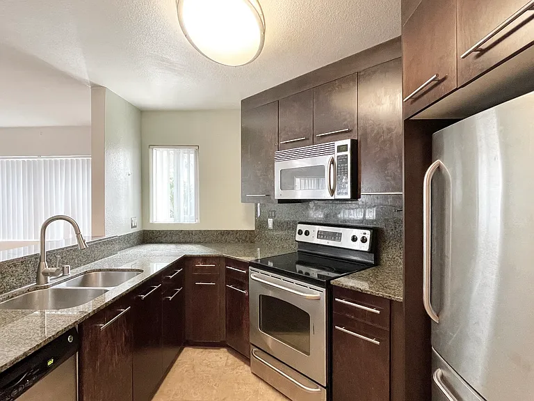 7565 Charmant Dr #405 — Photo 2
