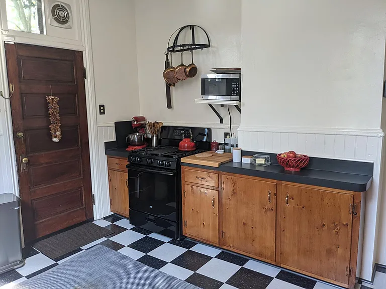 Kitchen with gas stove.