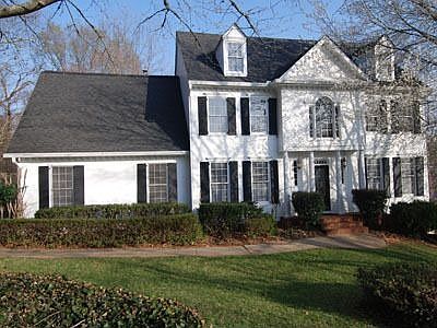 Located in River Station, the home is beautifully landscaped