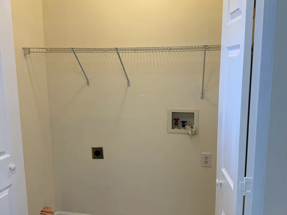 Laundry room connections and shelving. Note: please make sure your washer and dryer fit the area. Extra fee charged for removing and installing doors.