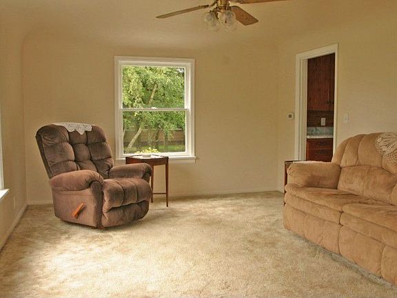 Good sized living room with large windows to bring in natural light