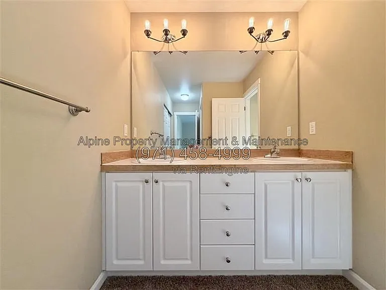 5758 NE Damsel Dr — Photo 36