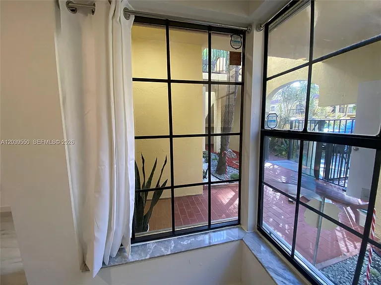 8807 SW 130th Pl #102 — Photo 1