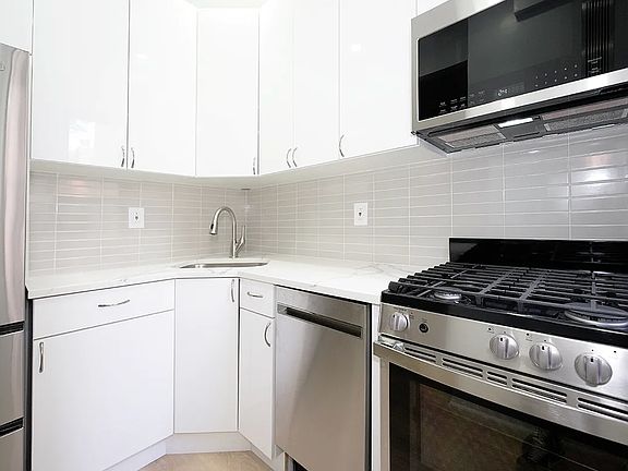 5th image of 145 W 12th St APT 2-3