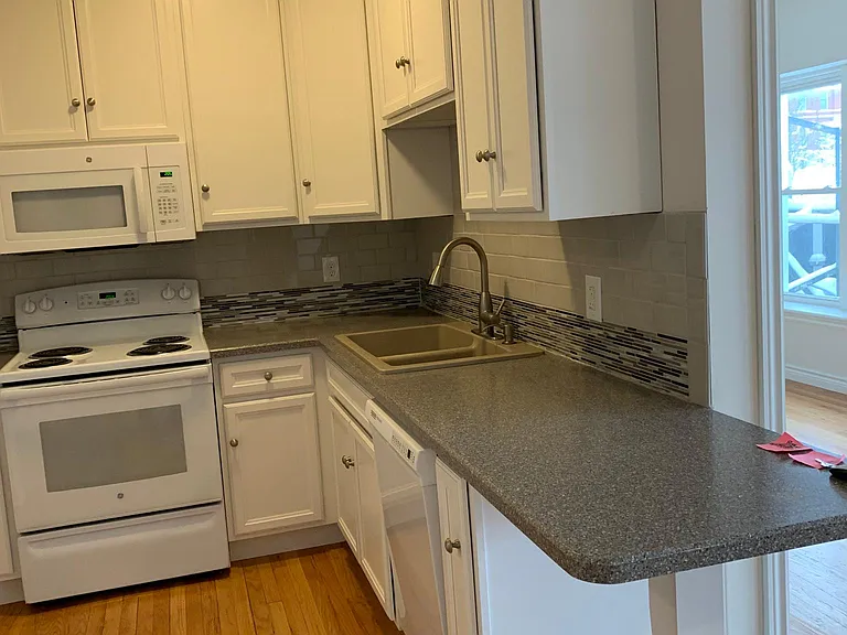 319 E Grand River Ave #1 — Photo 2