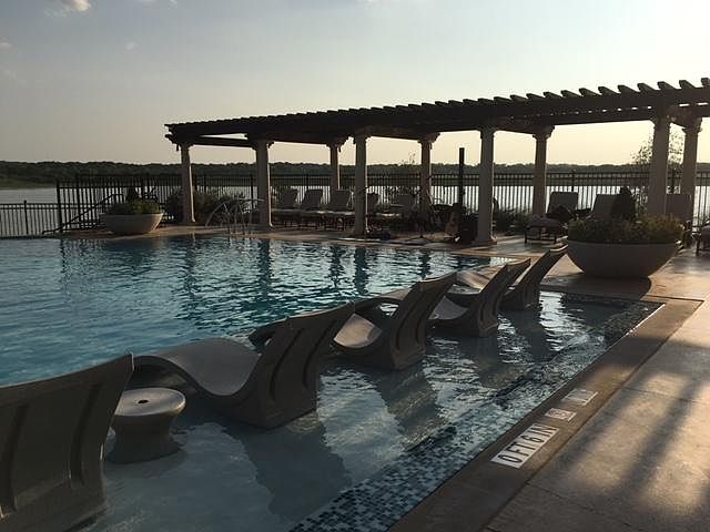 Initially had pictures of the house first. Then they built the salt water adult pool!