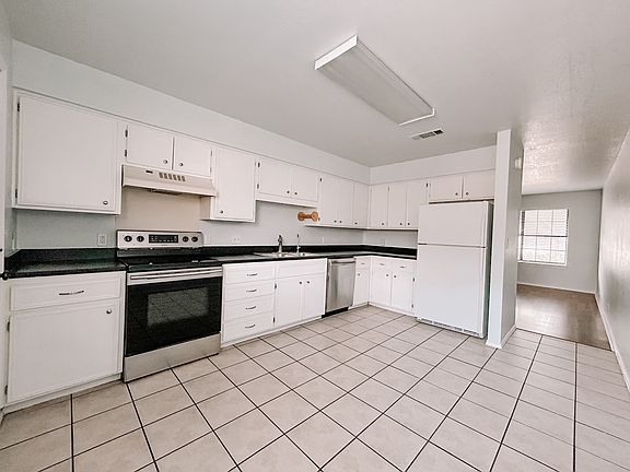 Kitchen, hall to living room