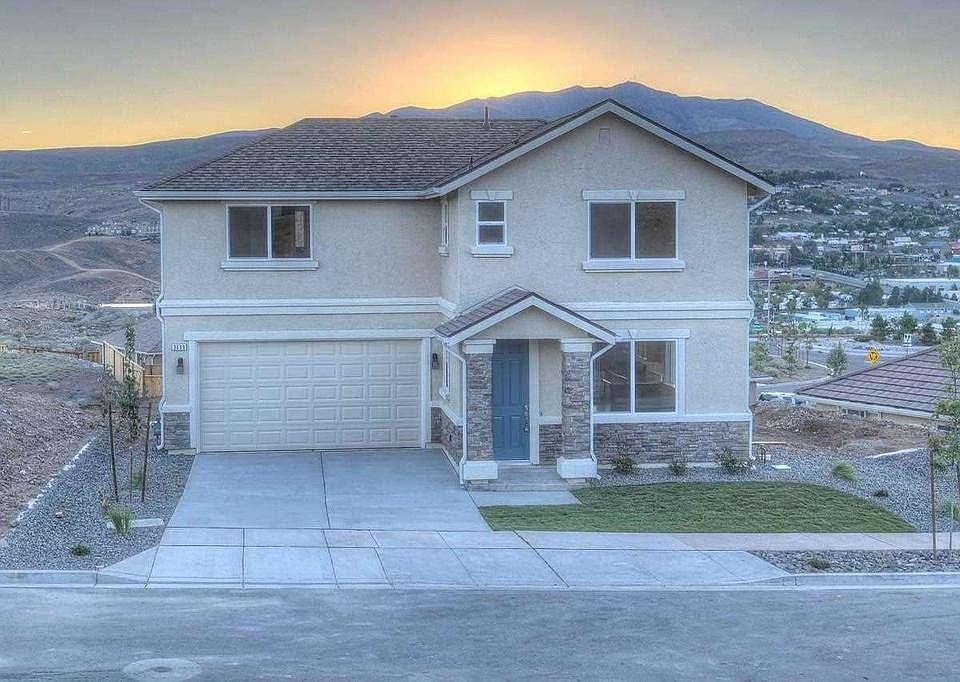 Front of House with 2 car garage