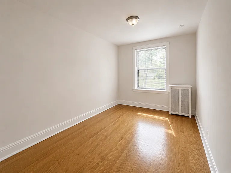 Front bedroom- street facing (West)- 9'7 x 15'