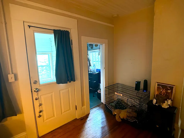 front door & coat/storage-closet or small office entrance