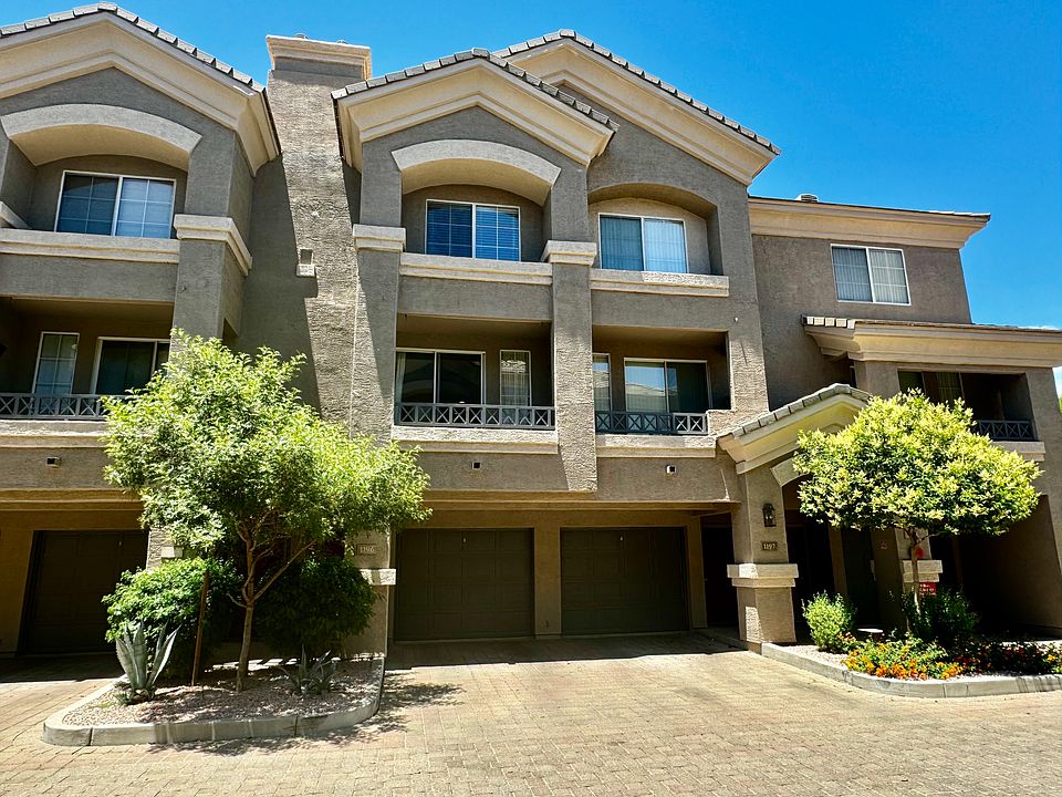 front of apartment, showing available parking in front of the garage.
