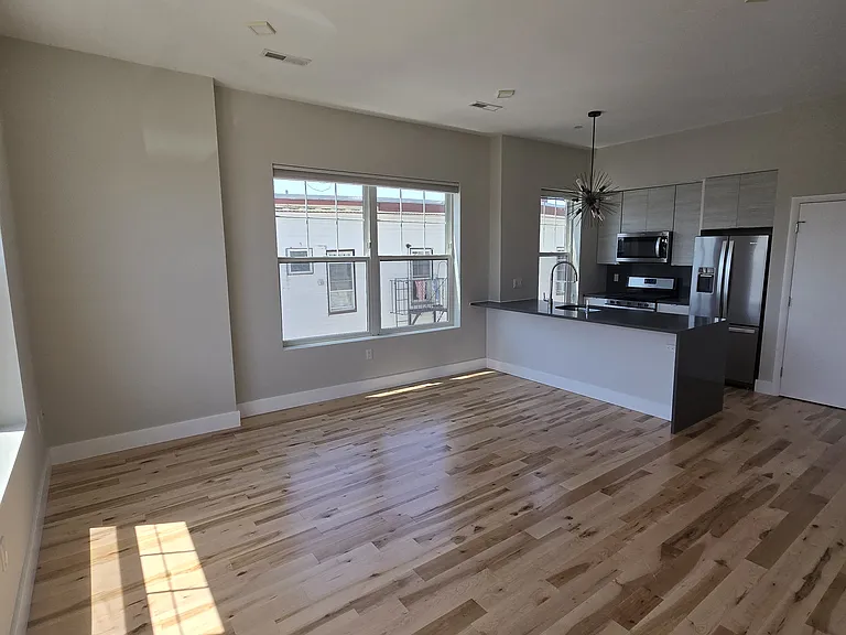 Kitchen and main living space (current photo).