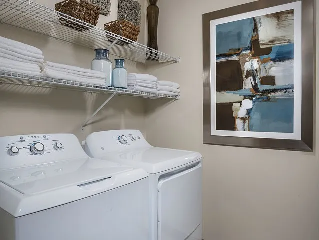 Full size washer and dryer in laundry room