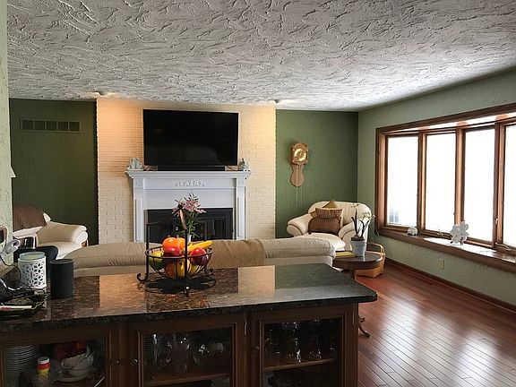 Living room w/ fp and view