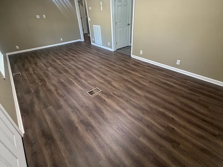 Spacious living room with brand new flooring!