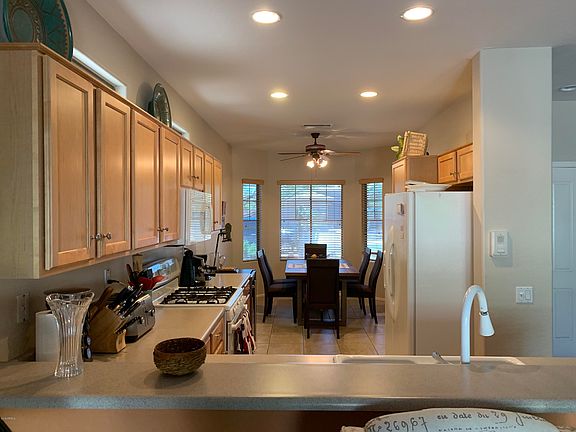 5th image of 16968 W Desert Rose Ln