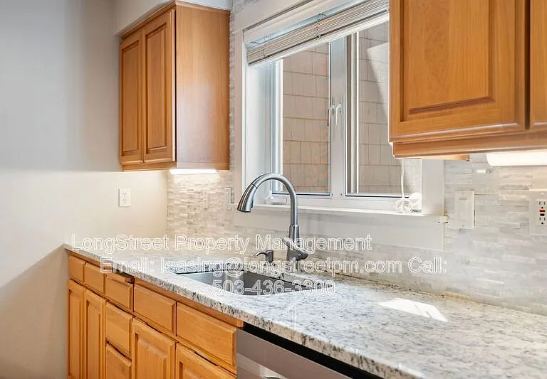 10247 NW Village Heights Dr — Photo 19