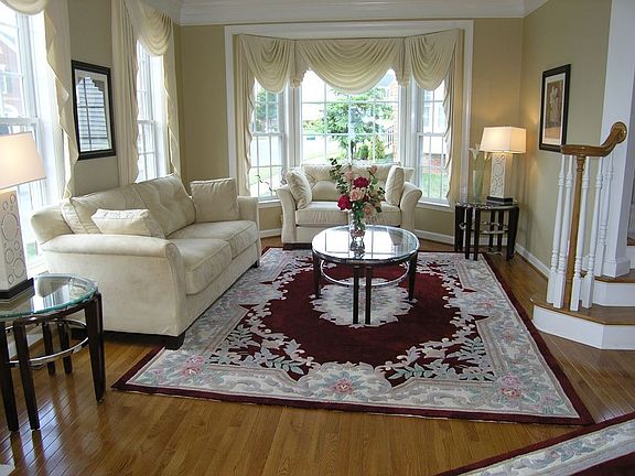 Look at this lovely LR w/bow window! 